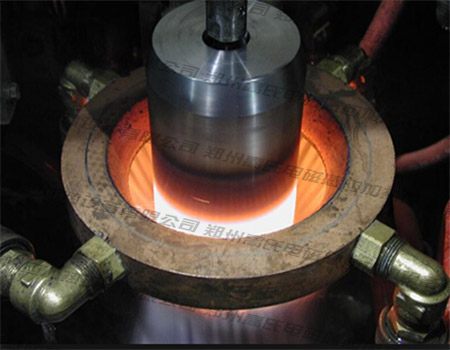高頻淬火設備對鑿巖機活塞的淬火處理